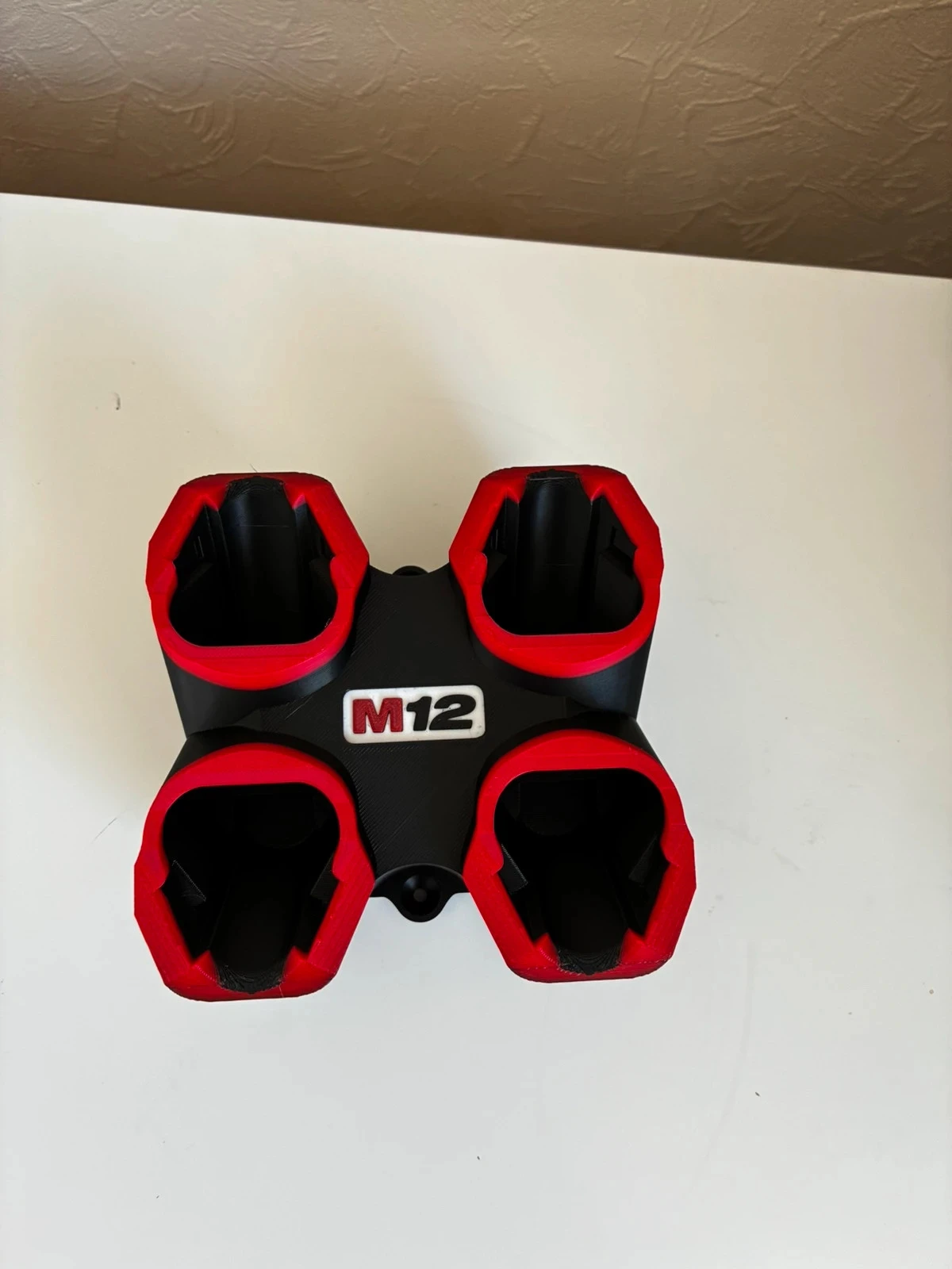 Support pour batterie m12